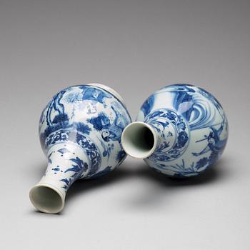 Two Transitional blue and white pear shaped vases, 17th Century.