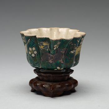 A famille verte bisquit cup, Qing dynasty, 17th century.