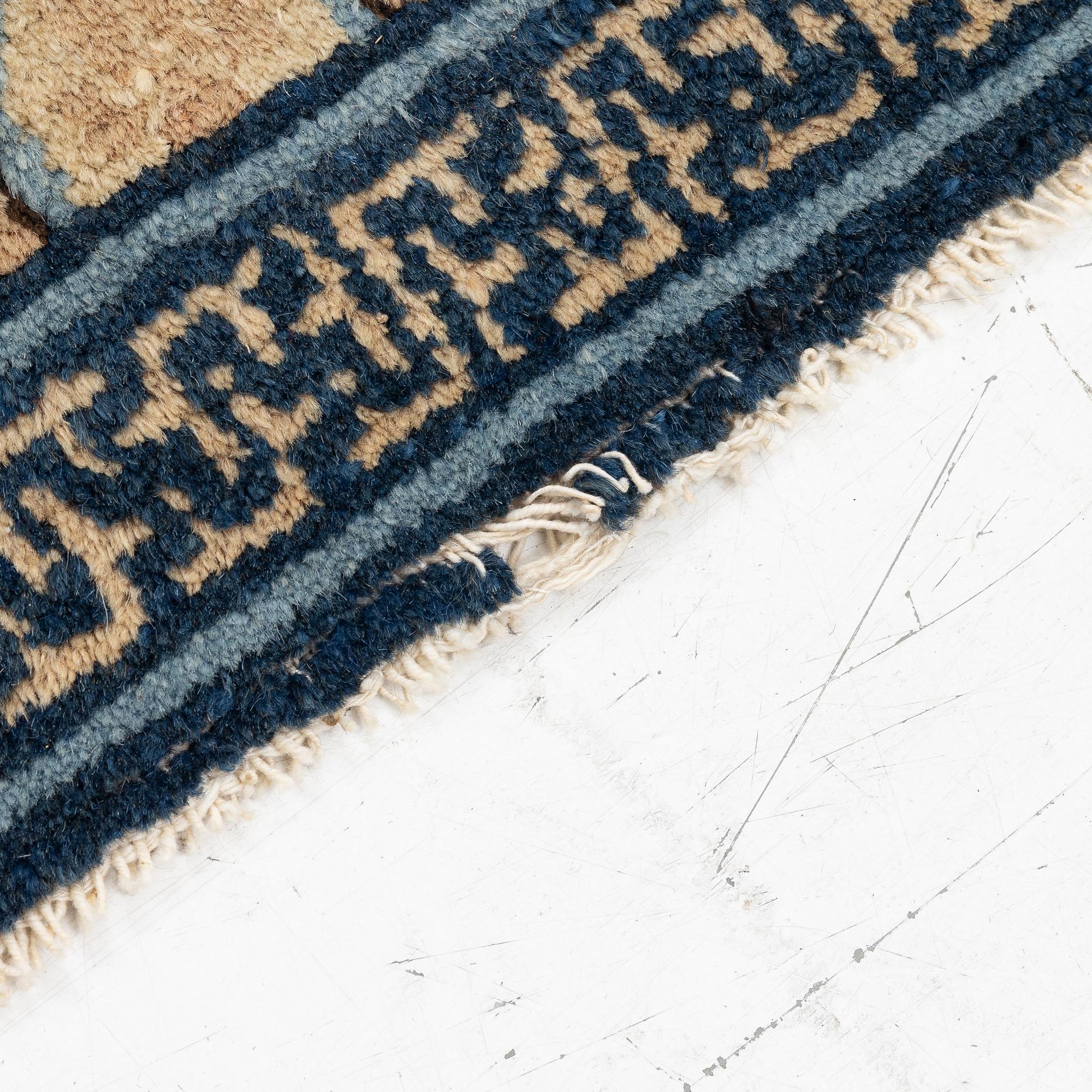 Two antique Ningxia meditation rugs, Qing dynasty, 19th century. c. 67 x 72 and 71 x 73 cm.