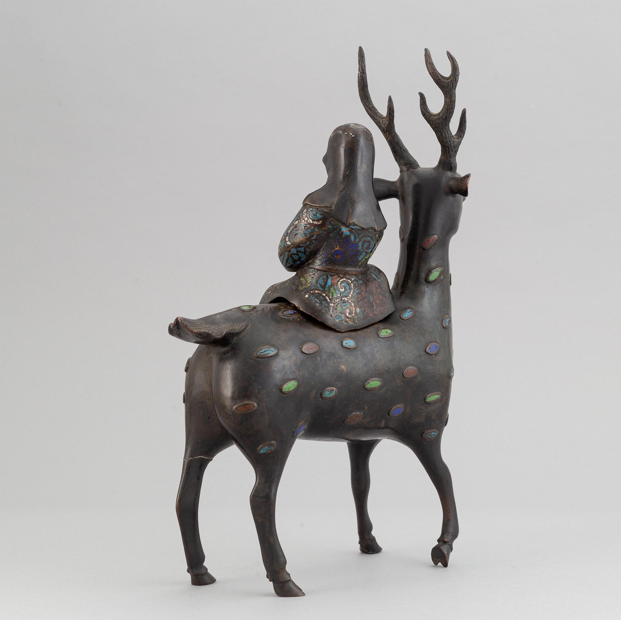 A bronze and enamel cencer in the shape of Shoulao on his deer, late qing dynasty 19th/20th century.