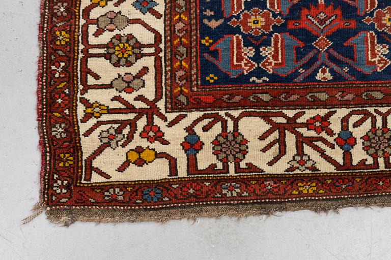 A rug, antique Kurdish, ca 247-253 x 116-125 cm.