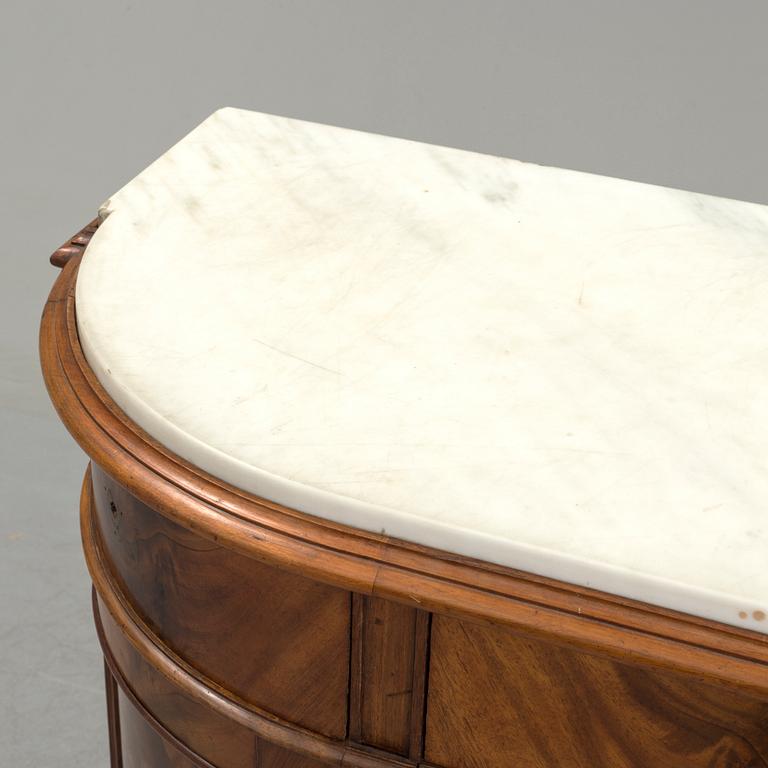 A 20th century marble top sideboard.