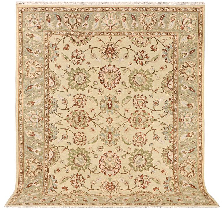 An oriental carpet with Mamluk design, c. 294 x 250 cm.