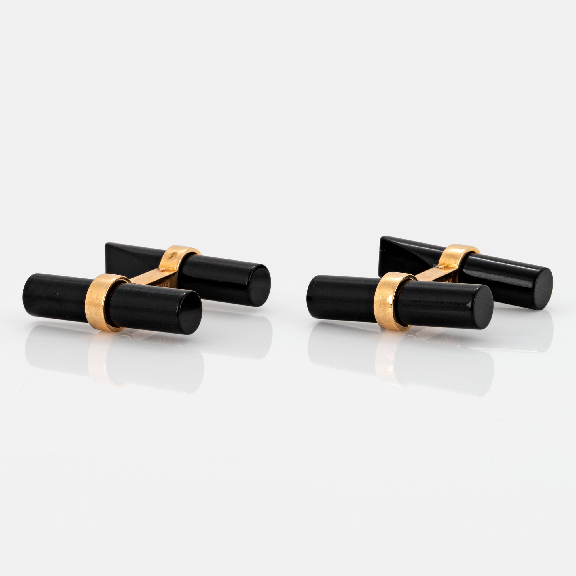 Cartier ett par manschettknappar 18K guld och onyx.