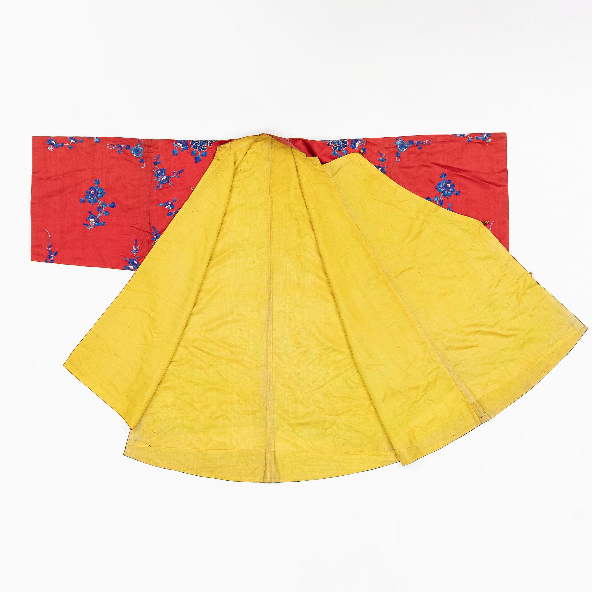 A Chinese semi-formal embroidered silk robe, late Qing dynasty, circa 1900.