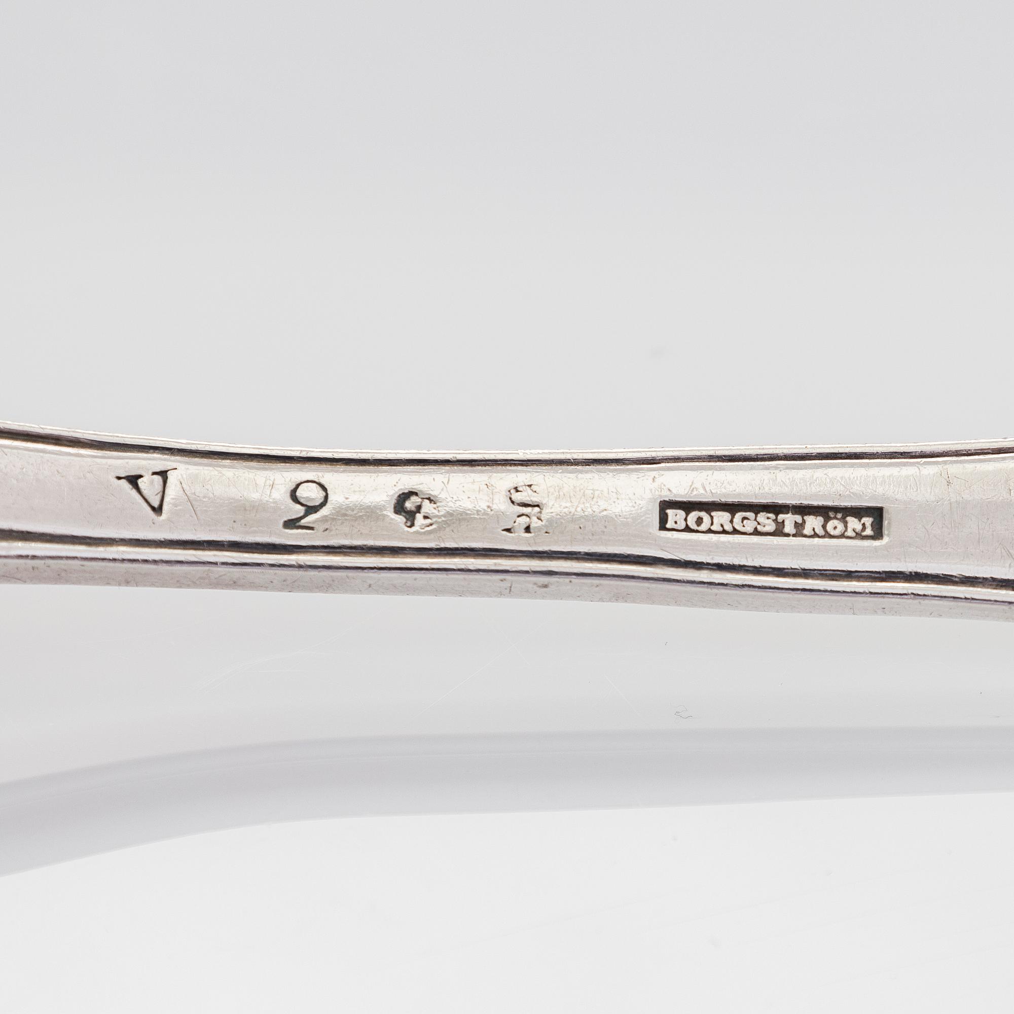 A silver beaker, maker's mark Isak Carlstedt, Porvoo ca. 1831, and silver spoon by Carl Fredrik Borgström, Turku 1803.