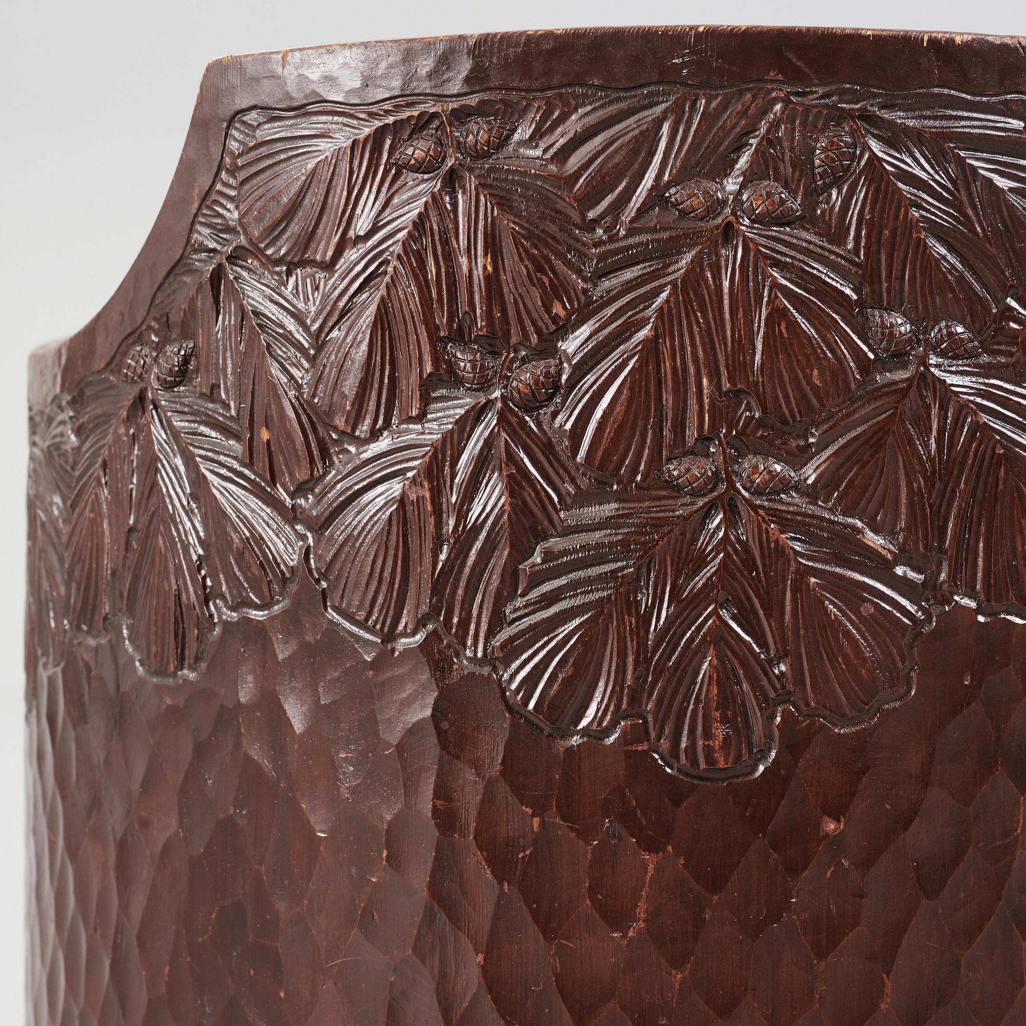 Otto Wretling, attributed to, a pair of Art Nouveau carved pine easy chairs,