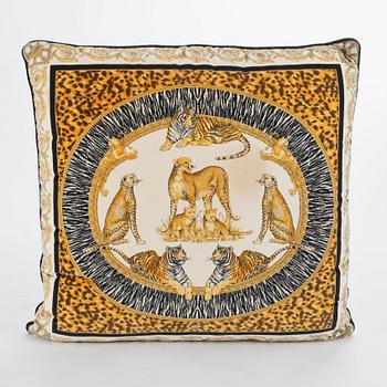 VERSACE, a velvet pillow.