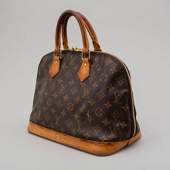 a LOUIS VUITTON 'Alma' bag.