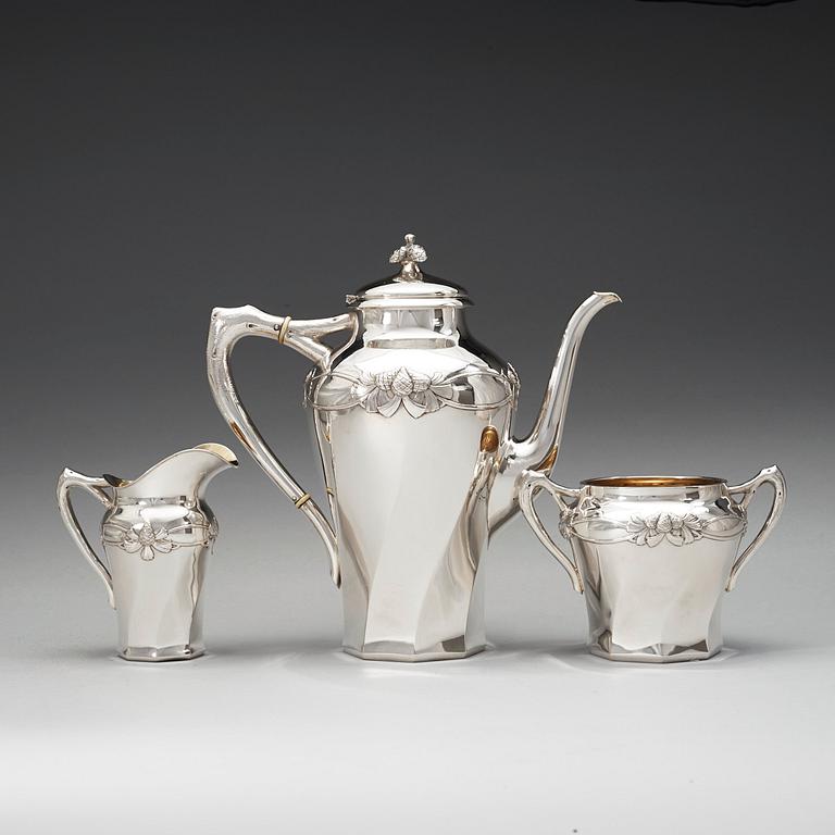 A C.G. Hallberg three pieces Art Nouveau silver coffee service, Stockholm 1904-1905.