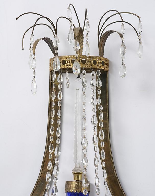 A pair of Russian Louis XVI-style  four-branch gilt bronze appliques, 19th century.