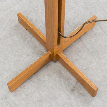 A 1960's teak floor lamp by Hans Kempe & Lars Ljunglöf.