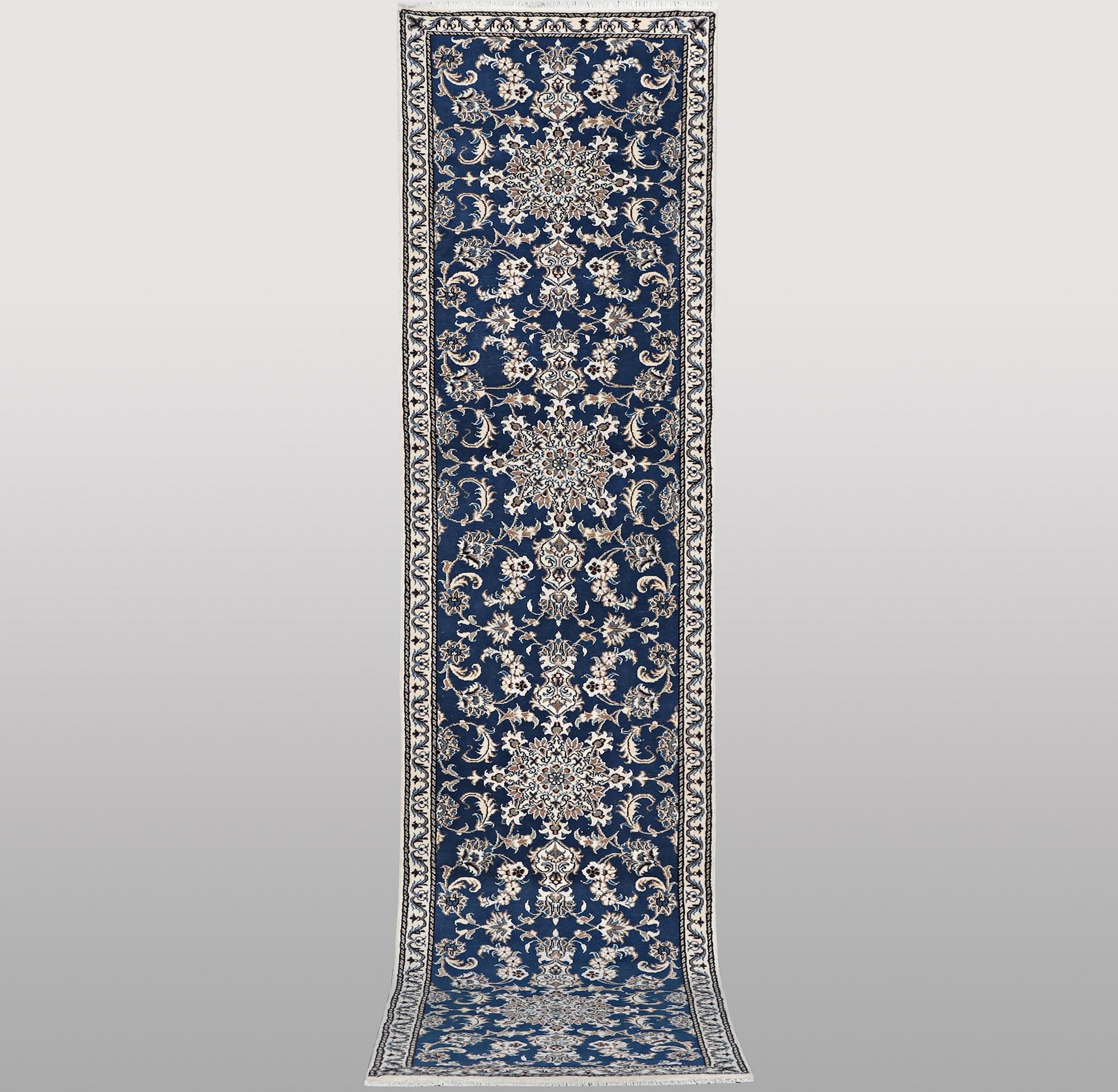 A runner carpet, Nain, part silk, ca 374 x 75 cm.