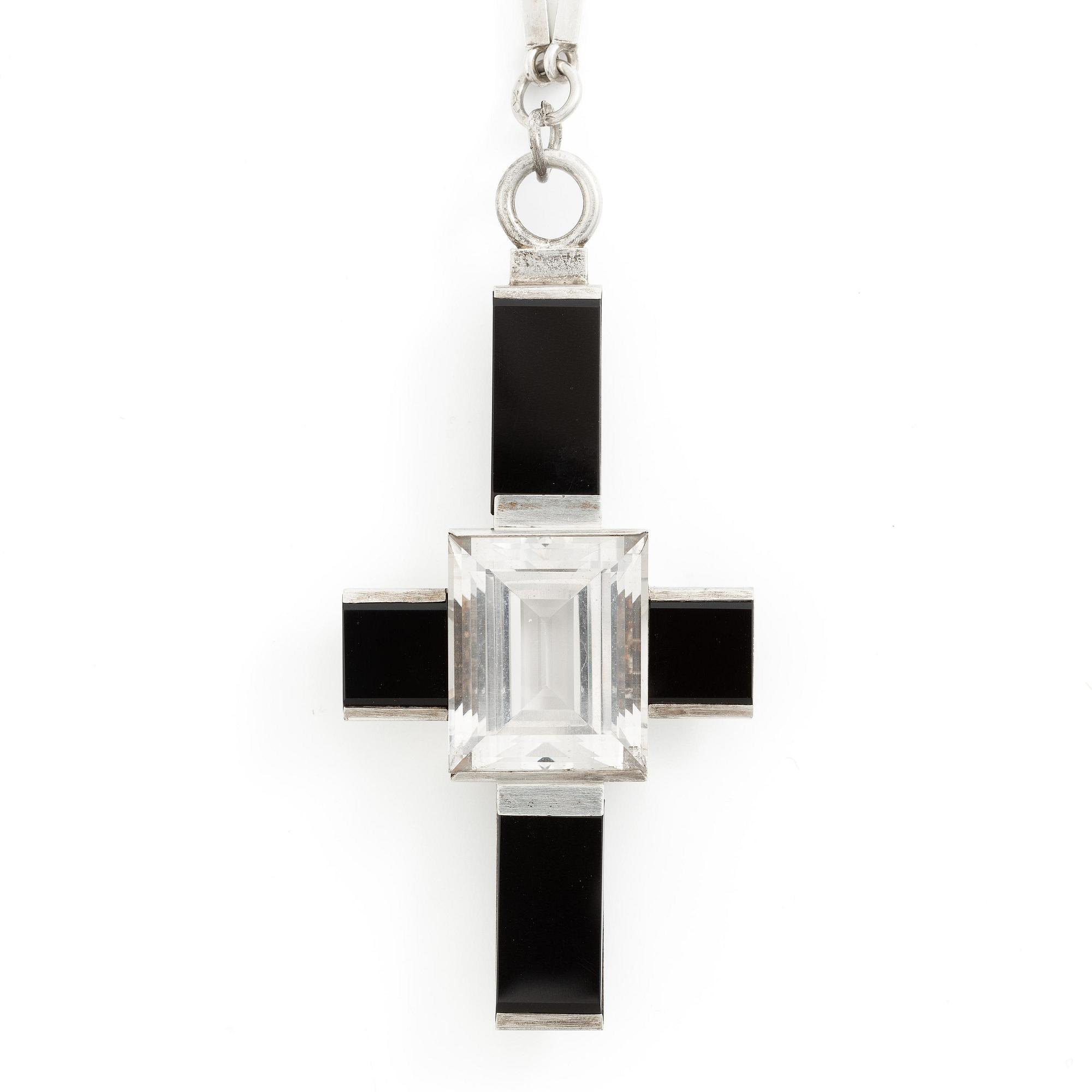 Wiwen Nilsson, a pendant in the form of a cross, sterling silver with onyx and step-cut rock crystal, Lund 1937.