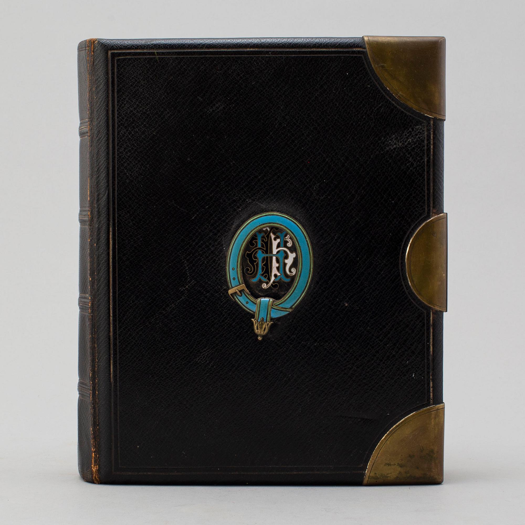 A PHOTO ALBUM, ca 150 photos, secod half of the 19th century.