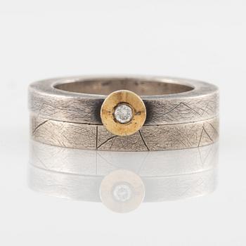 Pia Rauff, two rings in sterling silver set with a round brilliant-cut diamond.