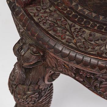 A pair of carved 'blackwood' armchairs, Bombay presidency, British Raj, circa 1880.