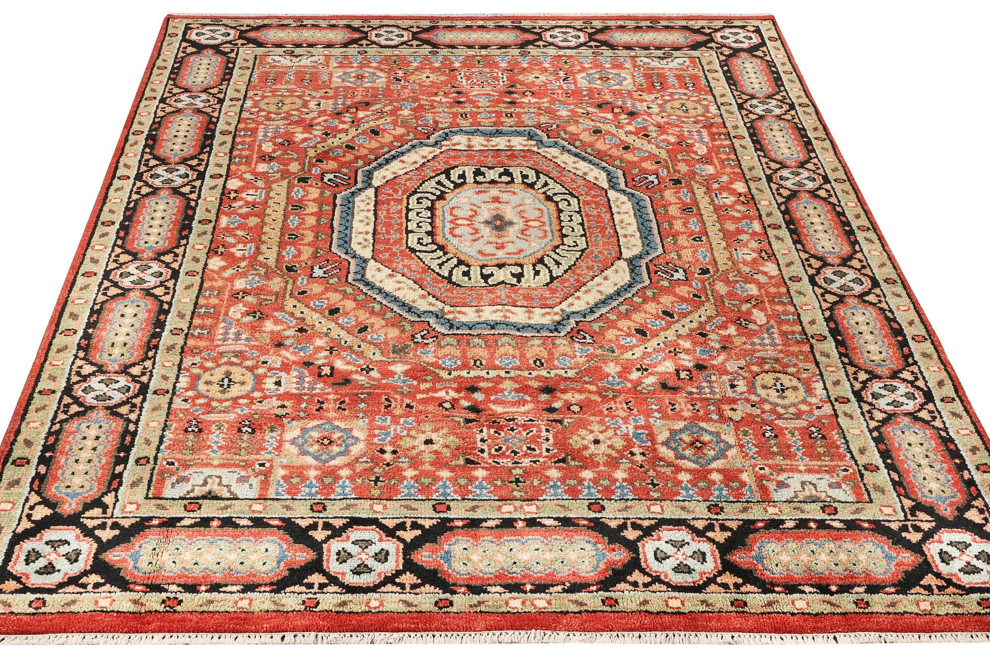 A Mamluk design carpet, c. 304 x 235 cm.