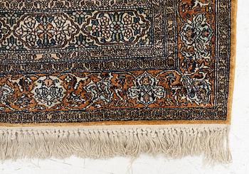 A silk Quum rug, c. 125 x 75 cm.