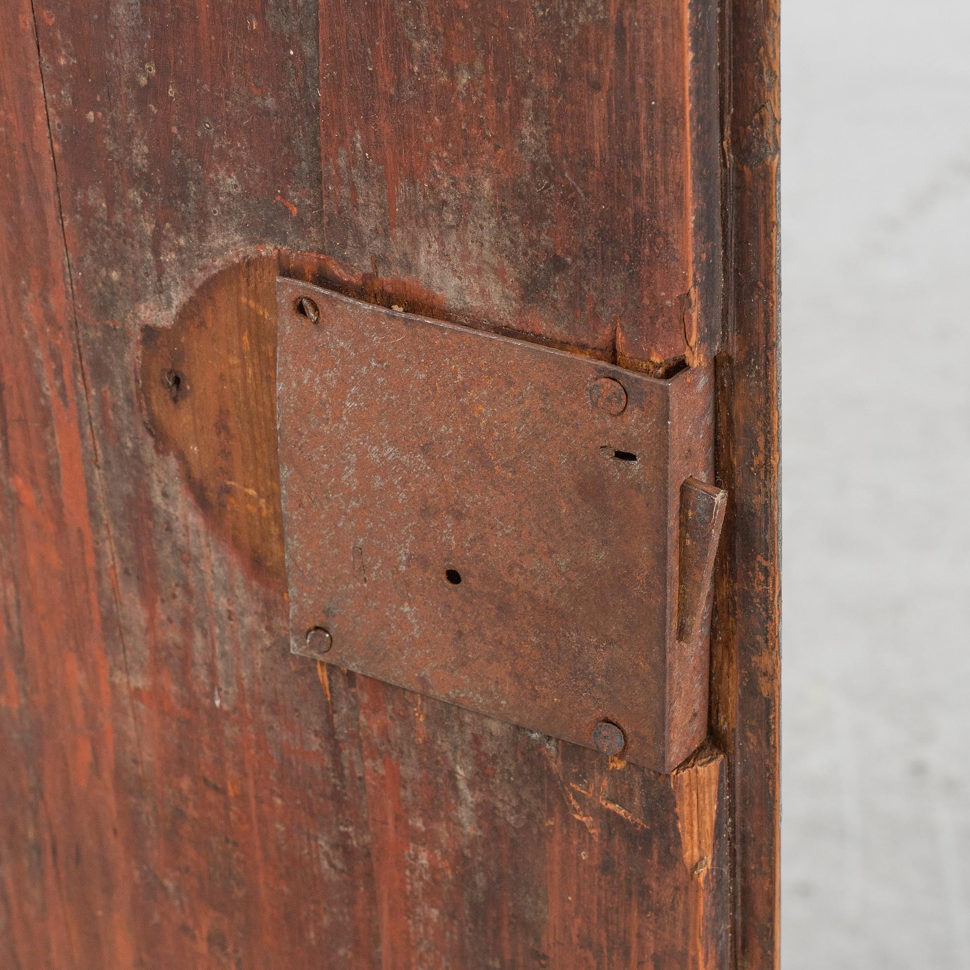 A painted corner cabinet, dated 1800.