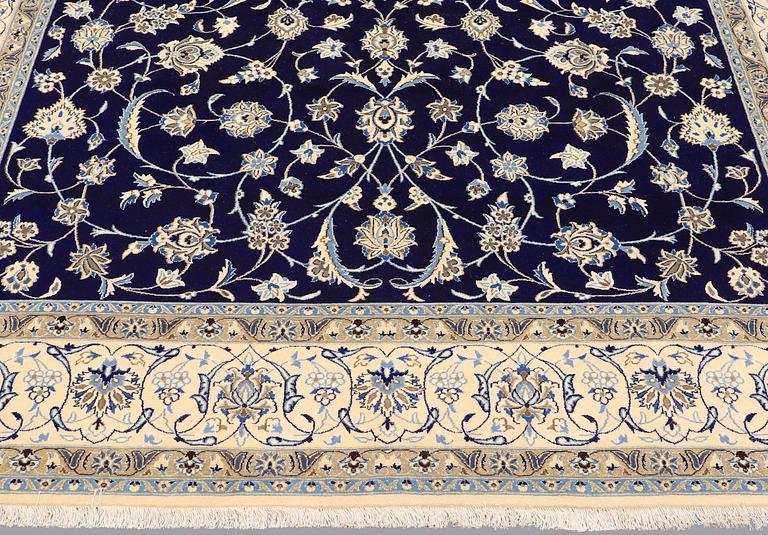 A carpet, Nain part silk, 350 x 250 cm.