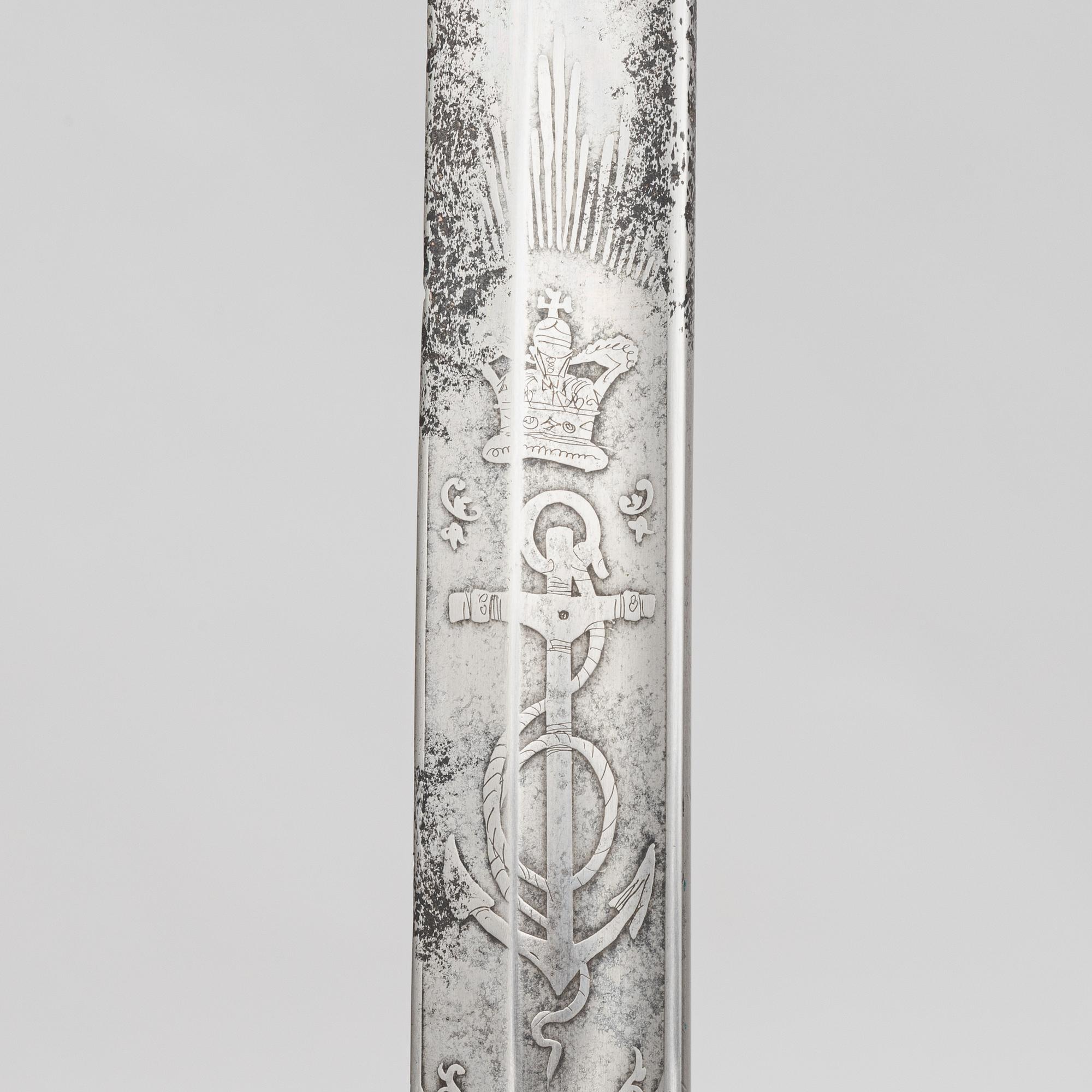 A Britiish Navy officer's sword 1827 pattern with scabbard.