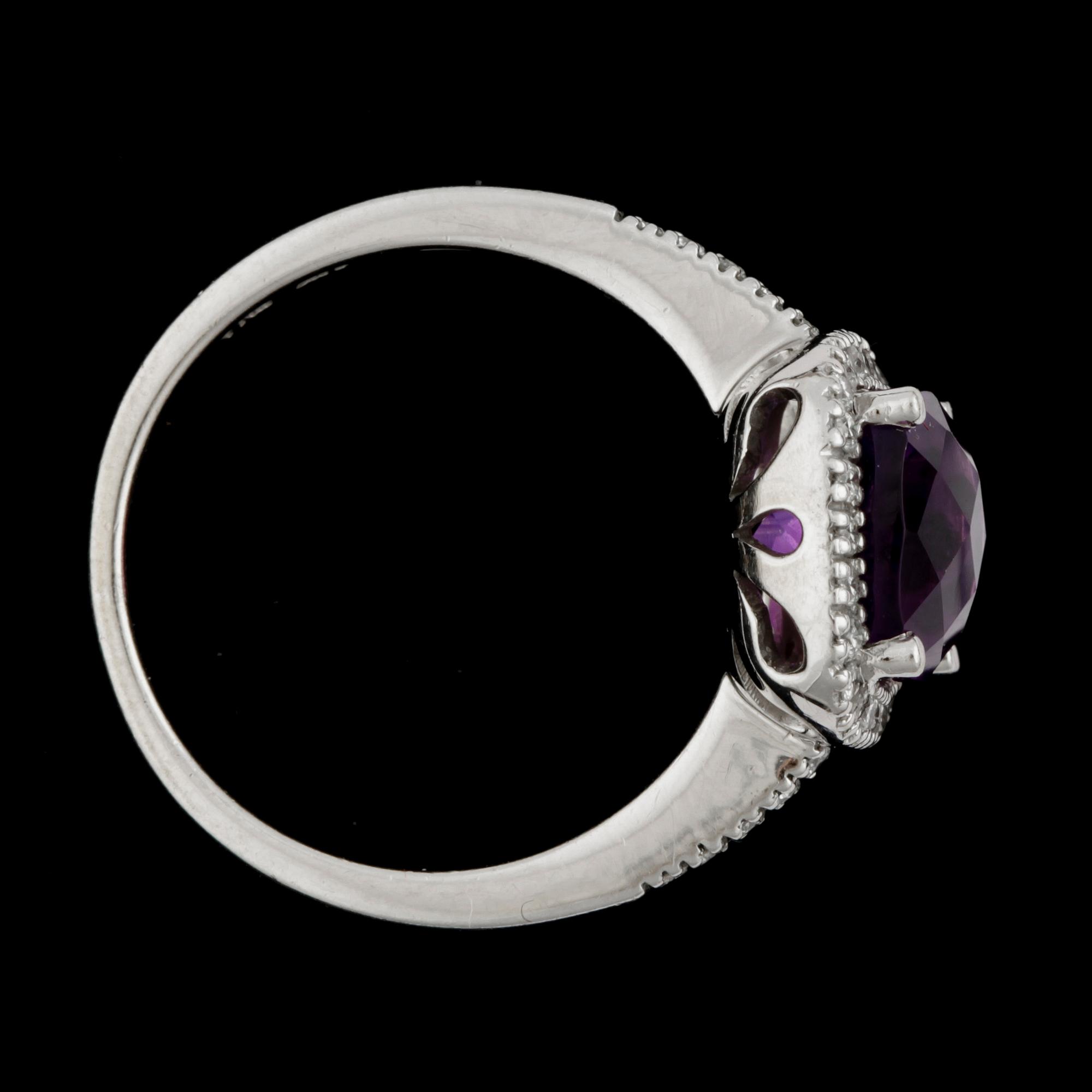 RING, 14k vitguld med ametist ca8x8xmm och briljantslipade diamanter tot ca0,17ct. Vikt 3,9g.