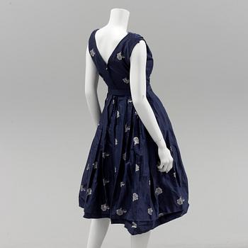 A Christian Dior 1950s midnight blue cocktail dress.