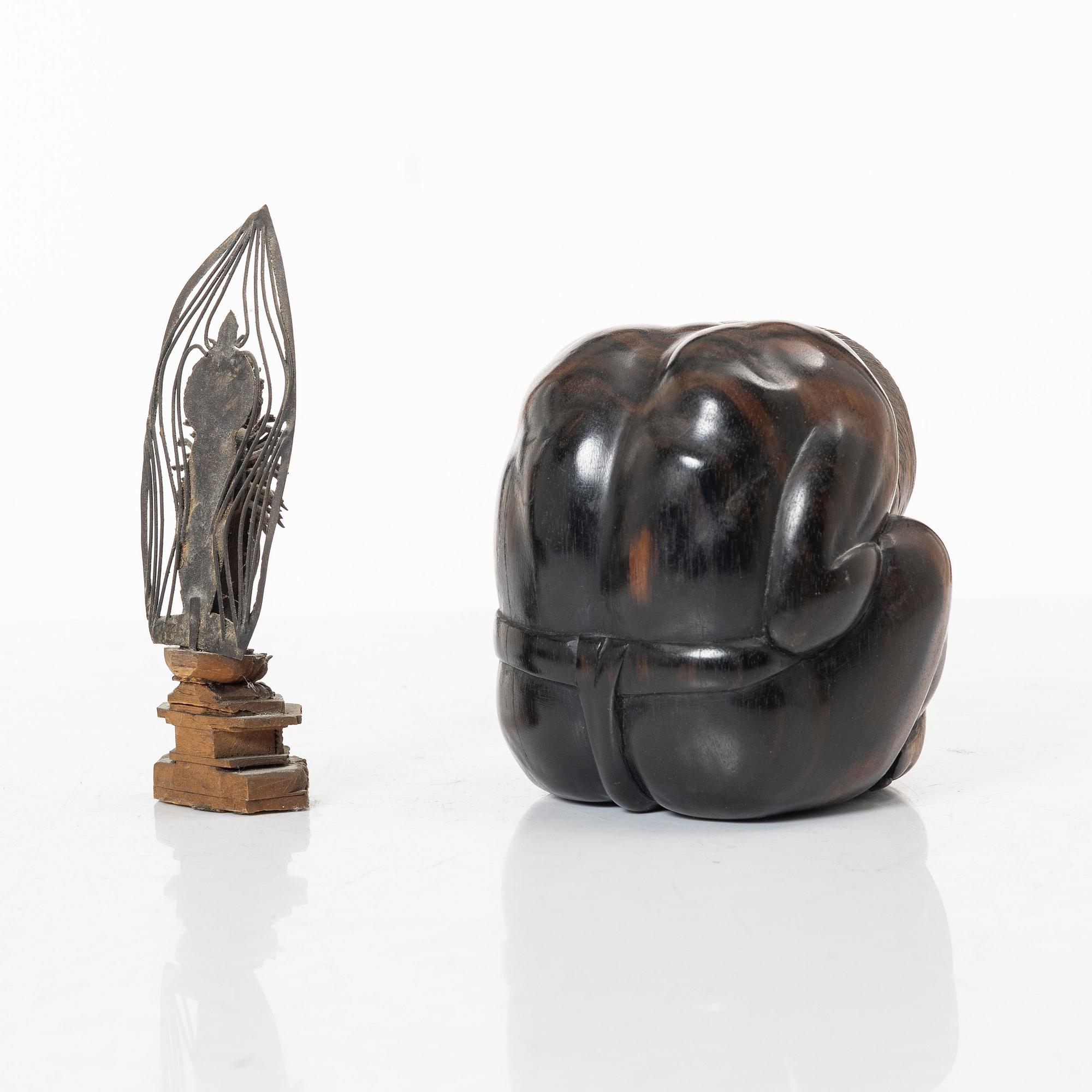 A portable buddhist altar and a figure of 'Weeping Buddha', Japan and Indonesia.