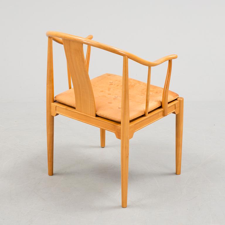 A Hans J Wegner 'Kinastolen' armchair, Fritz Hansen, Denmark 1971.