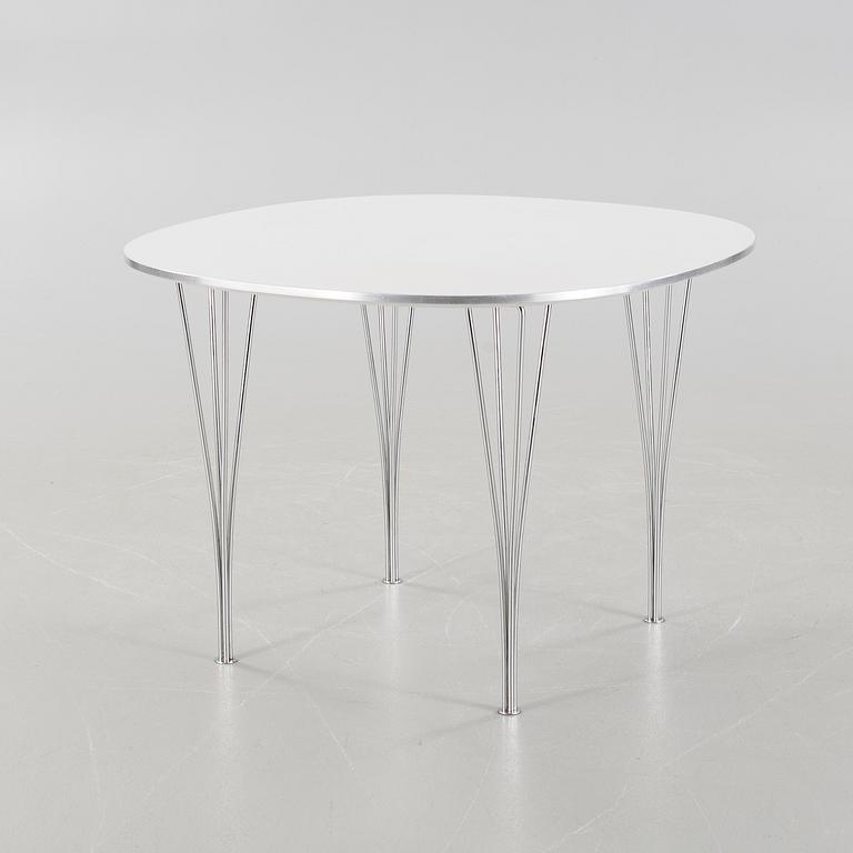 A table by Bruno Mathsson & Piet Hein for Fritz Hansen, model "Supercirkel", dated 1975.