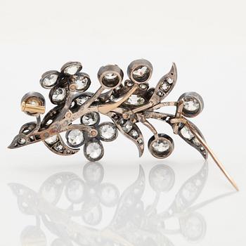 A gold and silver brooch set with old-cut diamonds, 19th century.