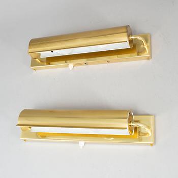 A PAIR OF BRASS WALL LAMPS FROM ÖIA.