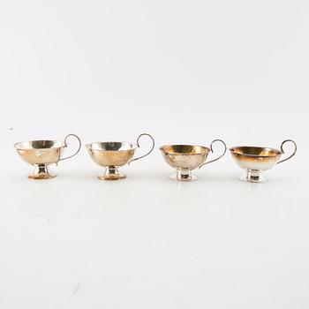 Punchmuggar, 12 st, silver, bl.a. CESONS, Göteborg 1974.