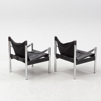 A pair of easy chairs, Johansson Design, later part of the 20th Century.