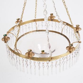 A late Gustavian gilt brass and cut glass seven-light chandelier, late 18th century.