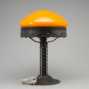 A early 20th century metal table light.