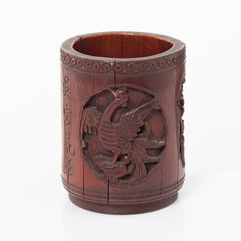 A Chinese bronze vase, joss stick holder and a bamboo brush pot, Qing dynasty.