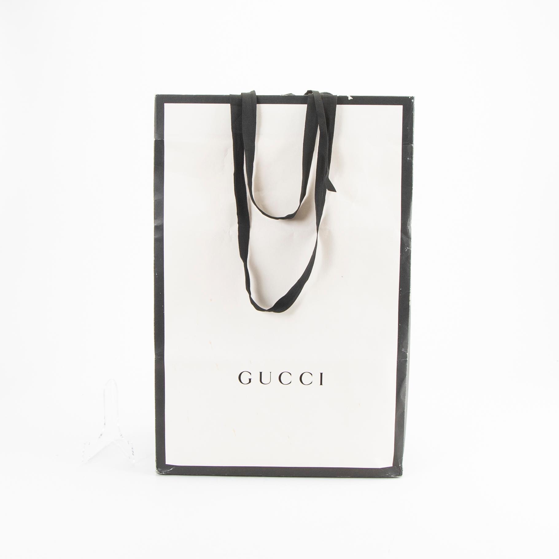 A Techno Web Stripe Canvas Tote  by Gucci.