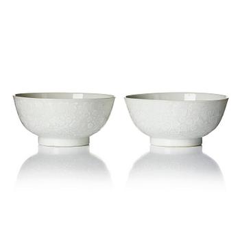 1231. A pair of white glazed lotus bowls, Qing dynasty, 18th century.