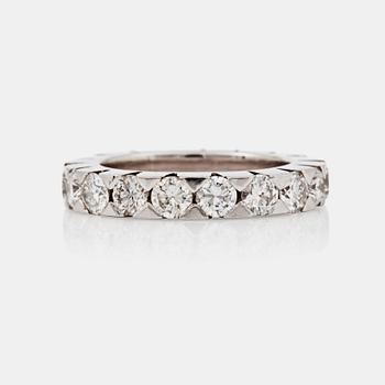 1134. An eternity ring, set with brilliant-cut diamonds. Total carat weight 3.24 cts. 18 x ca 0.18 ct.