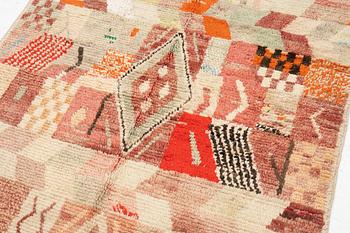 A Moroccan crpet, c. 240 (+7+8 cm flat weave) x 151 cm.