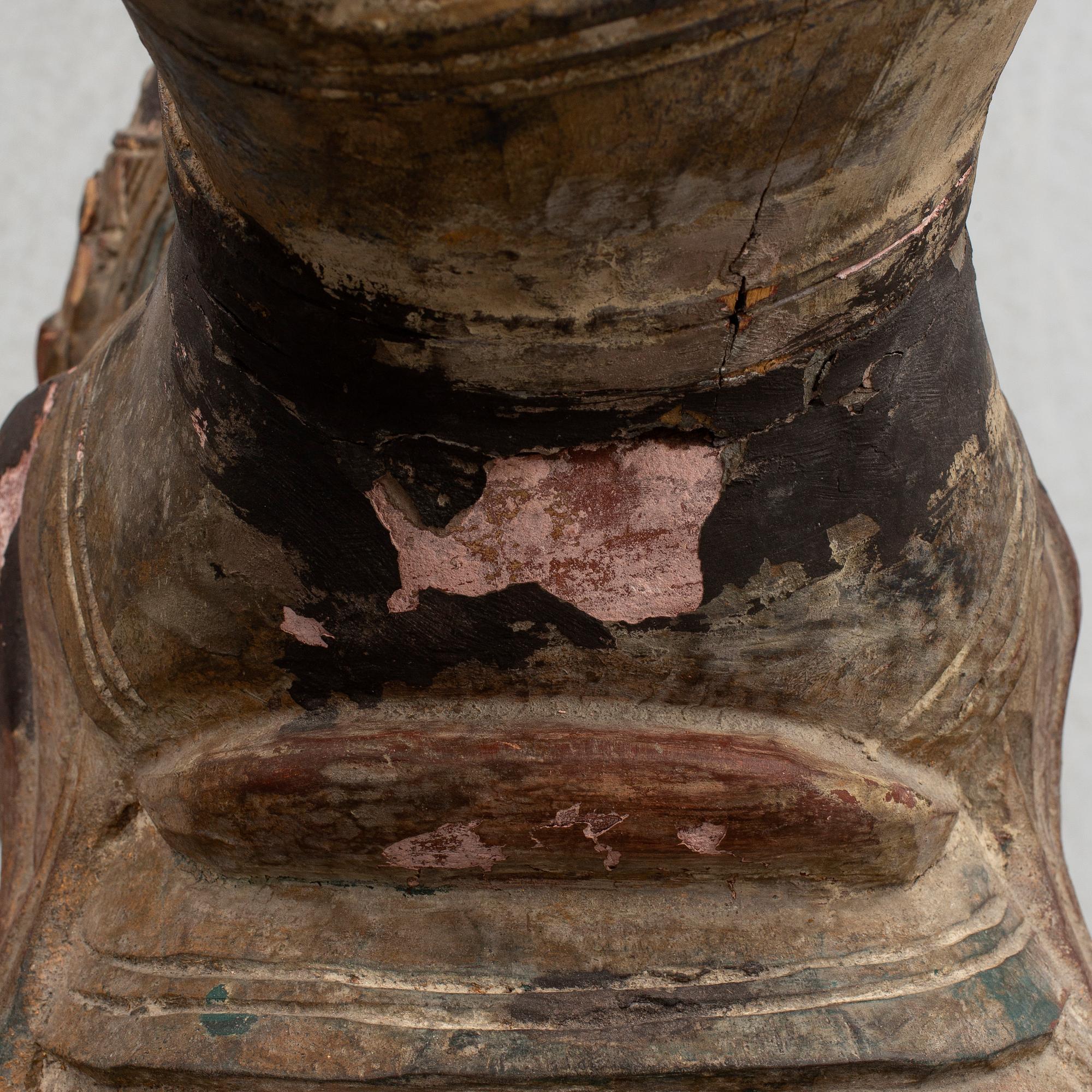 A large modern Chinese wooden sculpture.