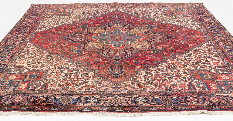 An oriental carpet, c. 330 x 285 cm.