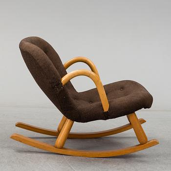A mid 20th century rocking chair, Muslingestolen, attributed to Philip Arctander.
