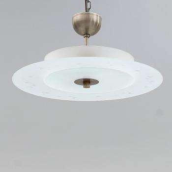 TAKLAMPA, 1900-talets mitt.