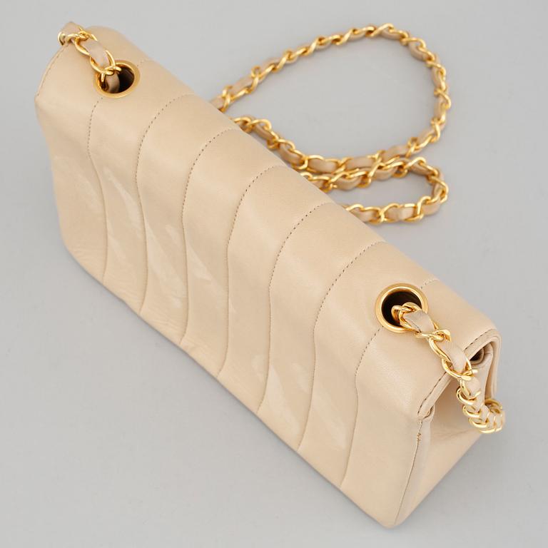 A Chanel lamb skin handbag.