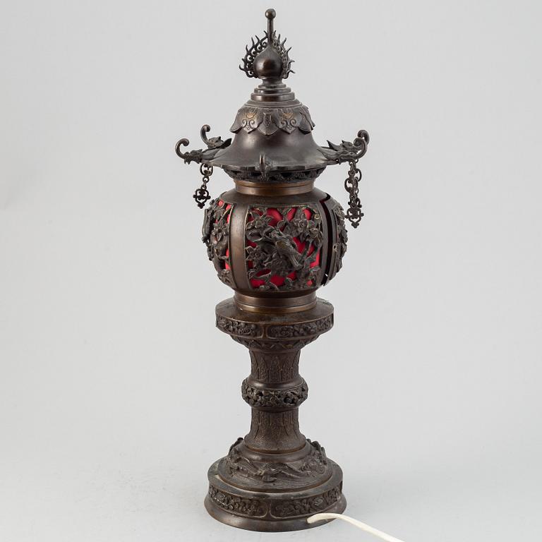 A Japanese bronze lantern, circa 1900.