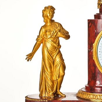 A French Empire 19th century gilt bronze mantel clock signed Lamiral.