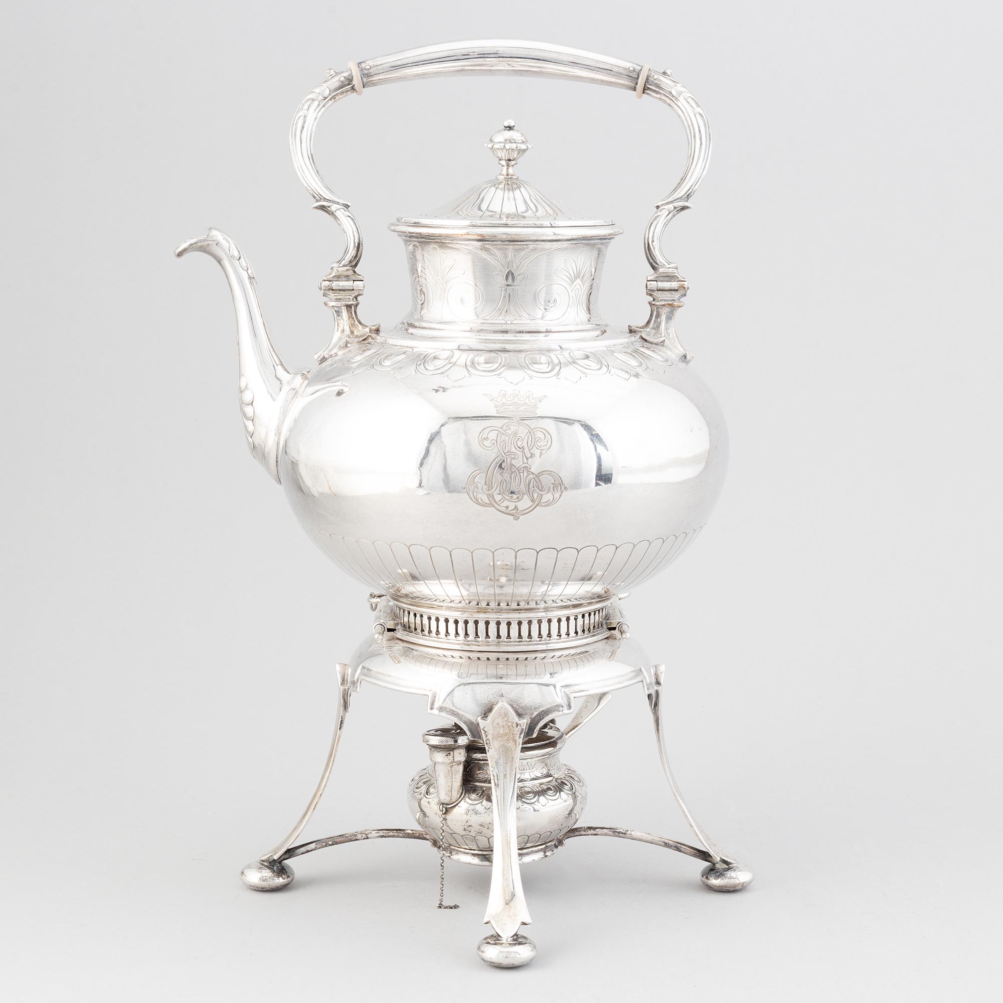 A Swedish late 19th century silver hotwater-/tea-pot, marked Möllenborg, Stockholm 1899.